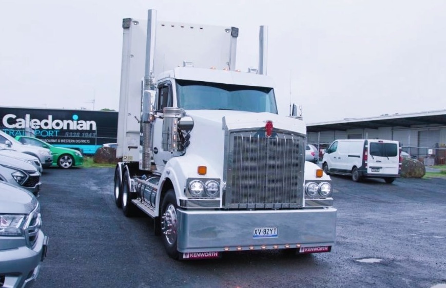 transport truck on the road, illustrating the role of logistics software in optimizing and managing the movement of goods