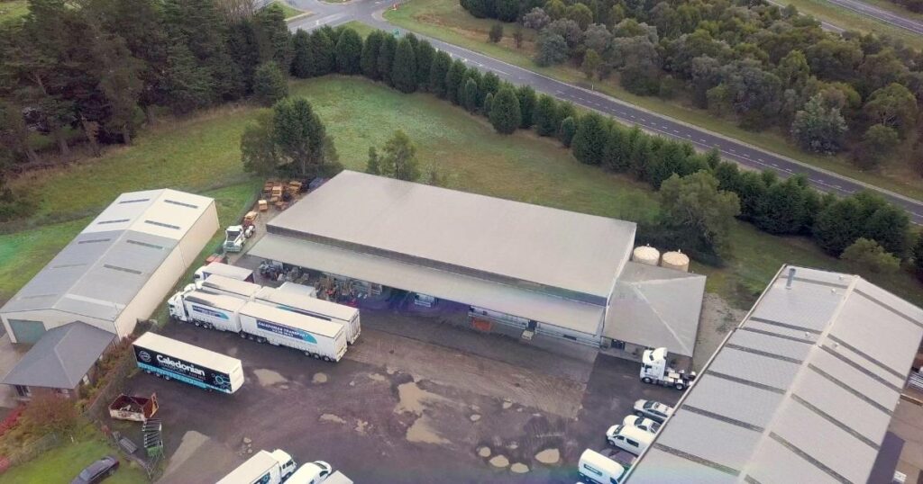 A top-down view of a warehouse, showcasing logistics and inventory management