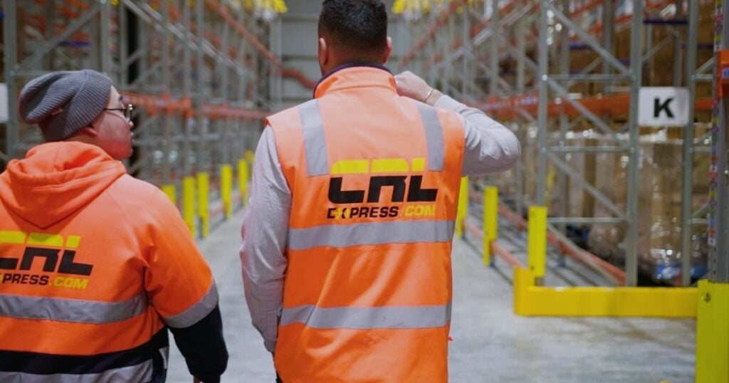 warehouse employees maximising and organising storage