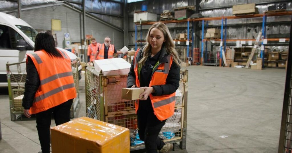 warehouse staff preparing packages for dispatch