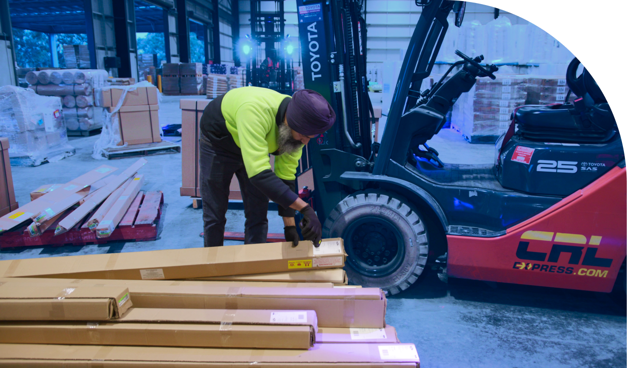 logistic man scanning packagesnshowcasing the integration of logistics software