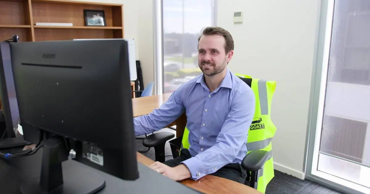 man working on office strategizing logistic operations