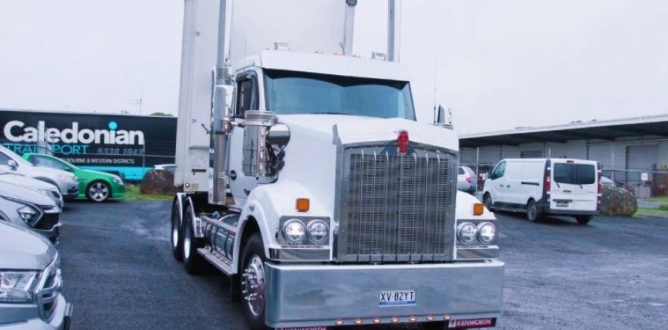 transport truck on the road, illustrating the role of logistics software in optimizing and managing the movement of goods