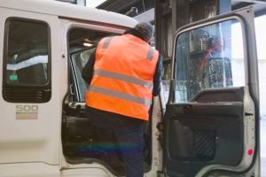 logistics driver embarking on a departure, ready to transport goods efficiently