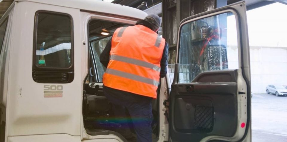 logistics driver embarking on a departure, ready to transport goods efficiently