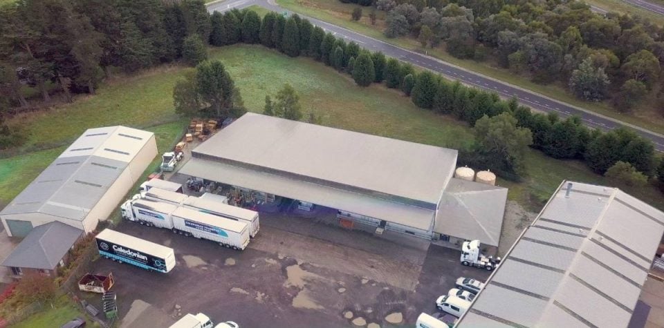 A top-down view of a warehouse, showcasing logistics and inventory management